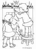 Kids decorating the fireplace for Christmas coloring page