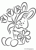 Easter bunny with flowers and Easter eggs