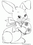 Happy bunny holding a Easter egg coloring page