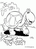 Happy turtle walking near of the bushes coloring page